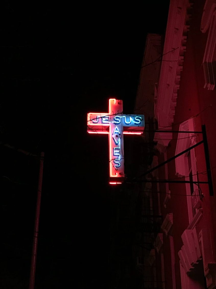 jesus saves neon signage