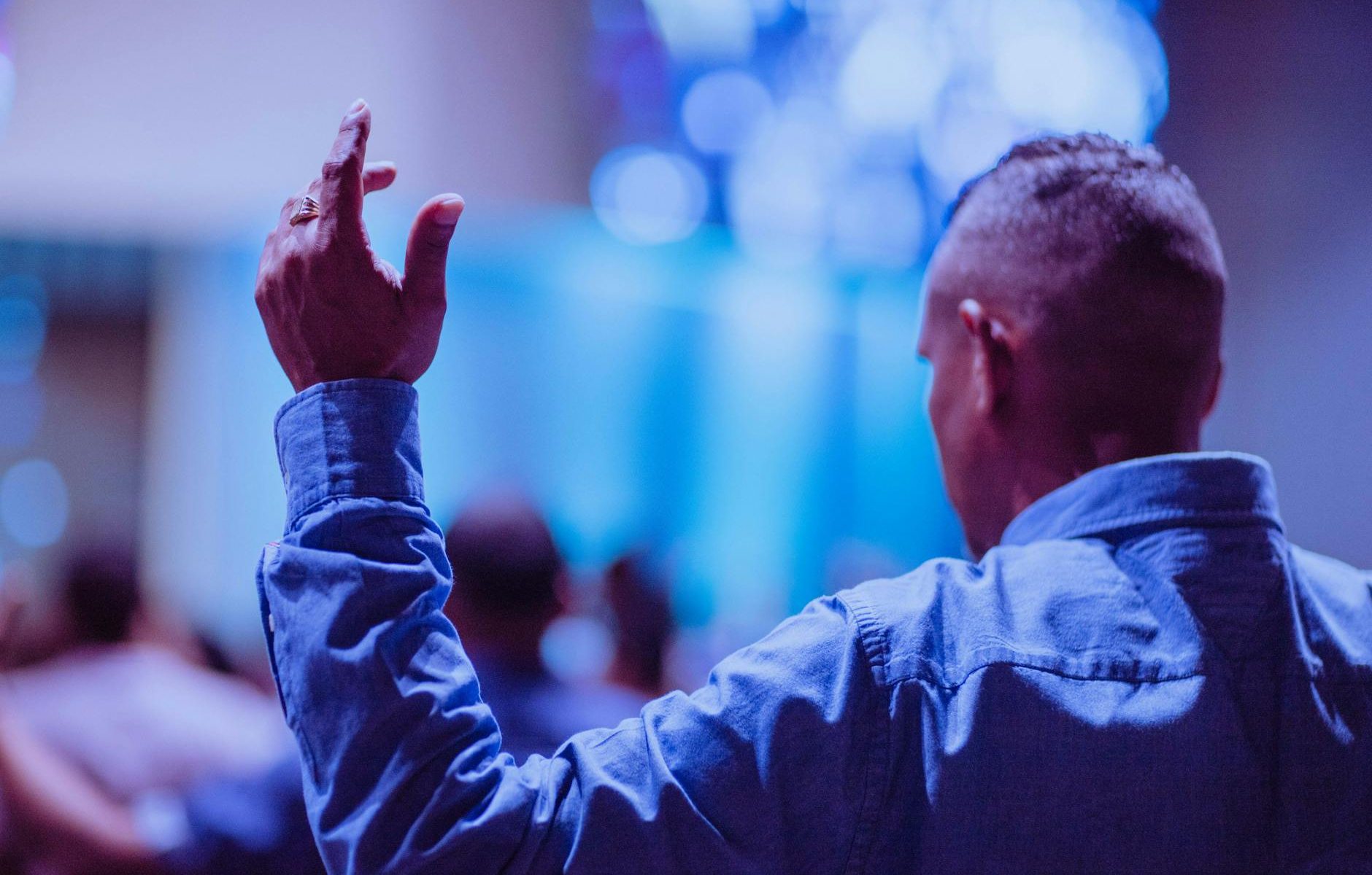 man wearing blue dress