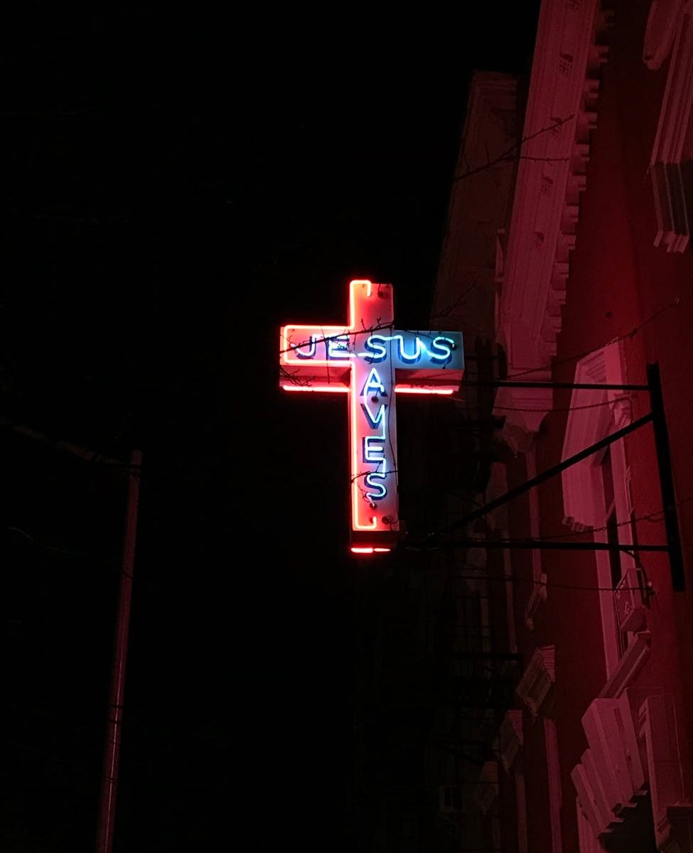 jesus saves neon signage