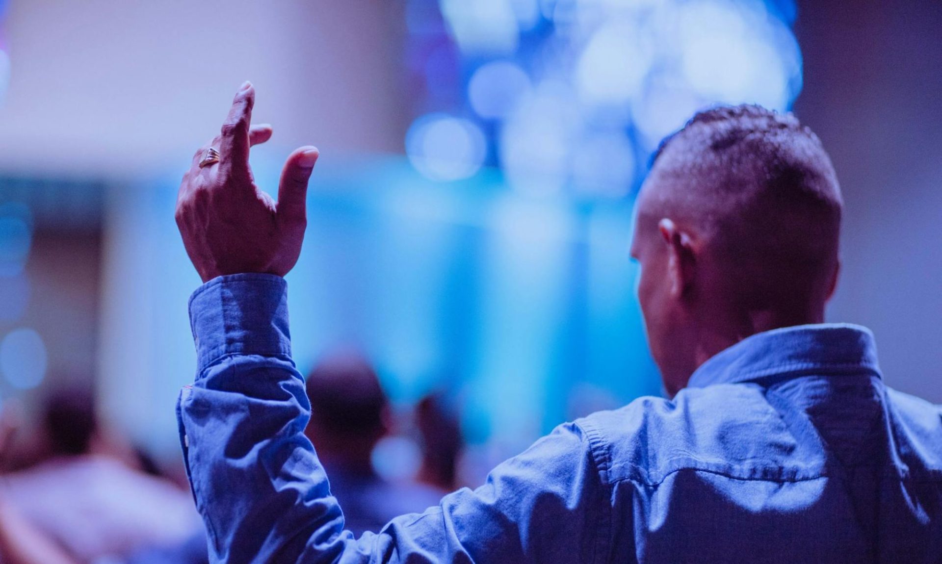 man wearing blue dress