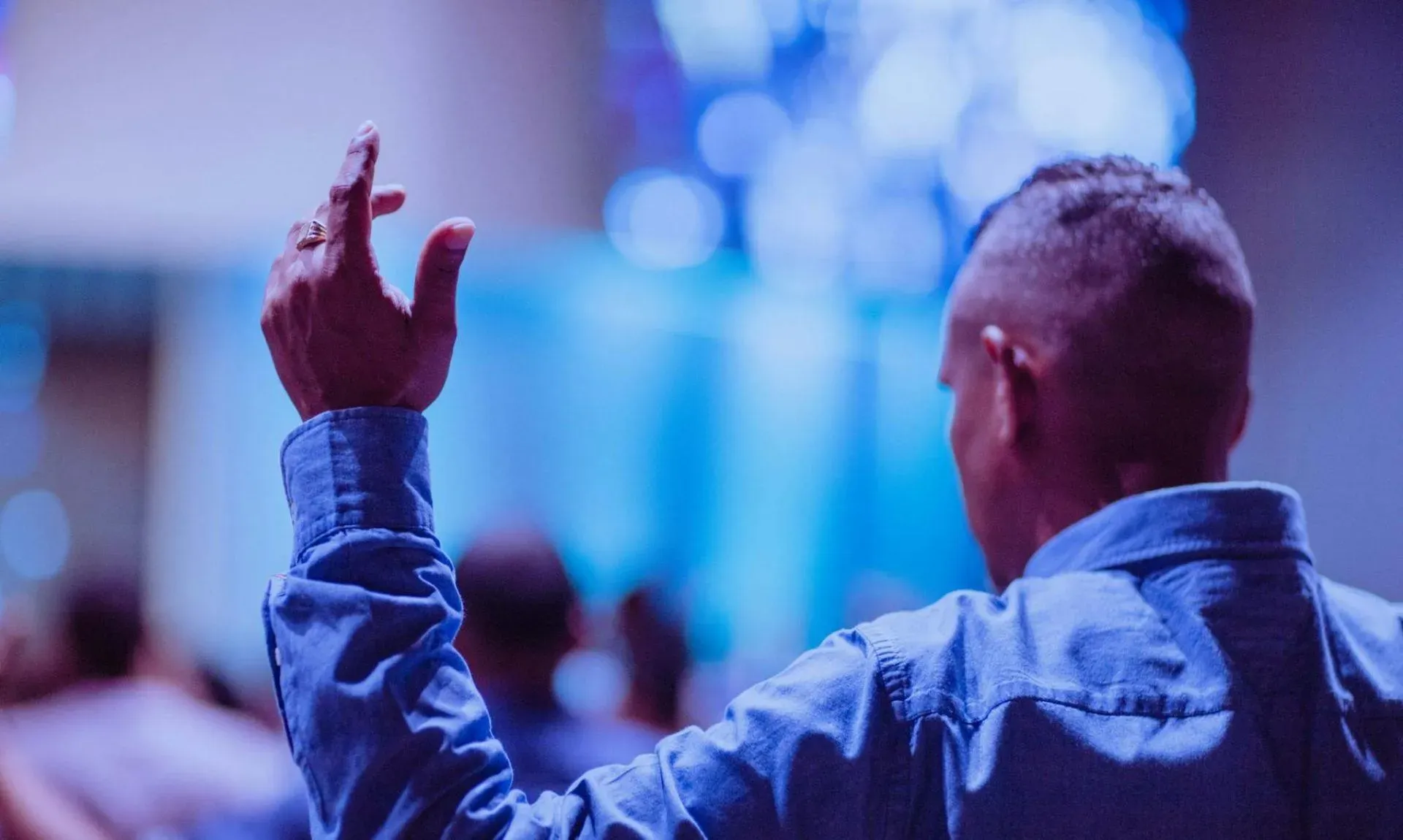 man wearing blue dress