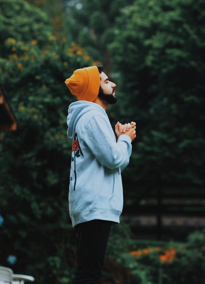man wearing bonnet and hoodie