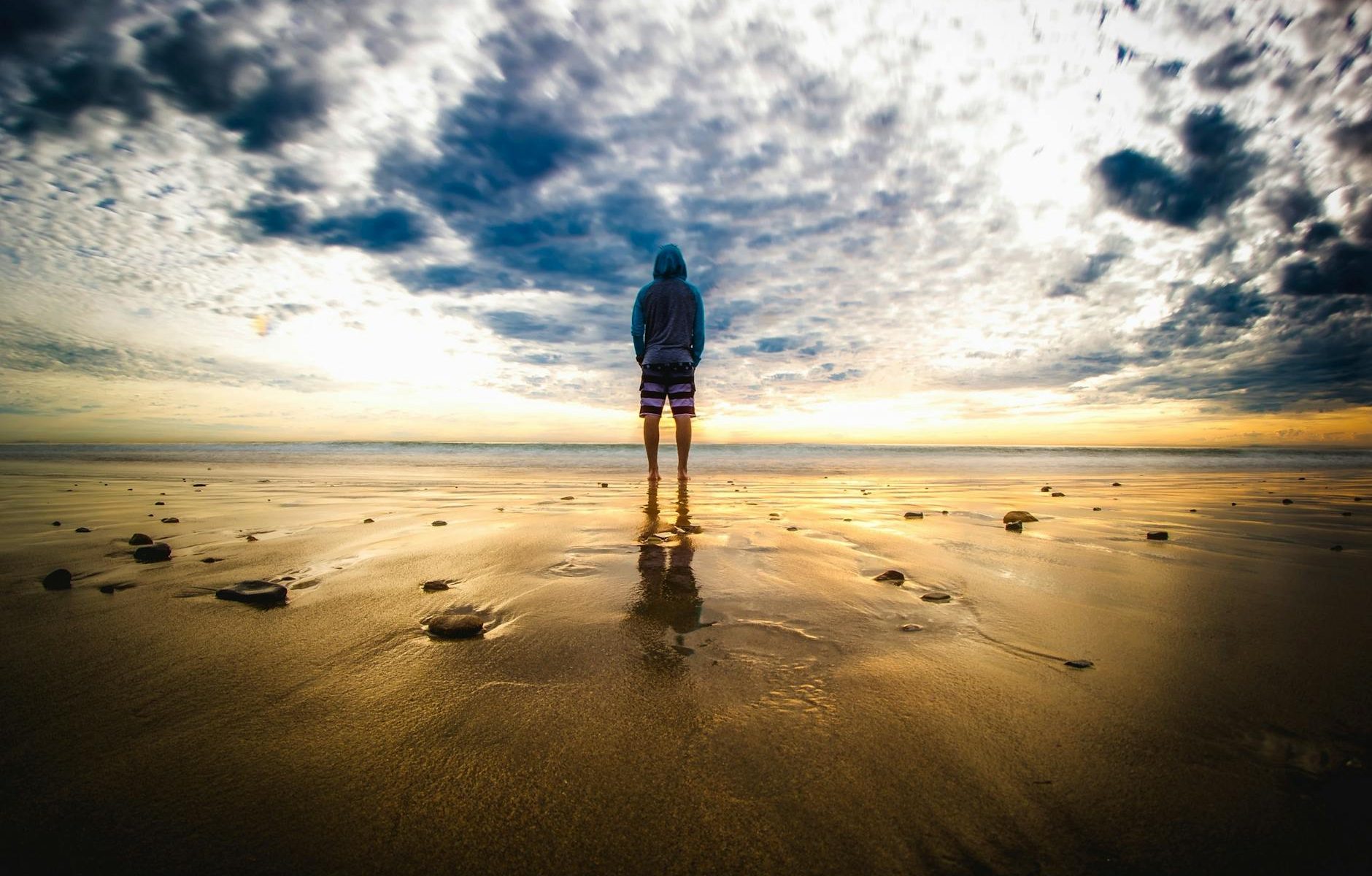 person standing on sand